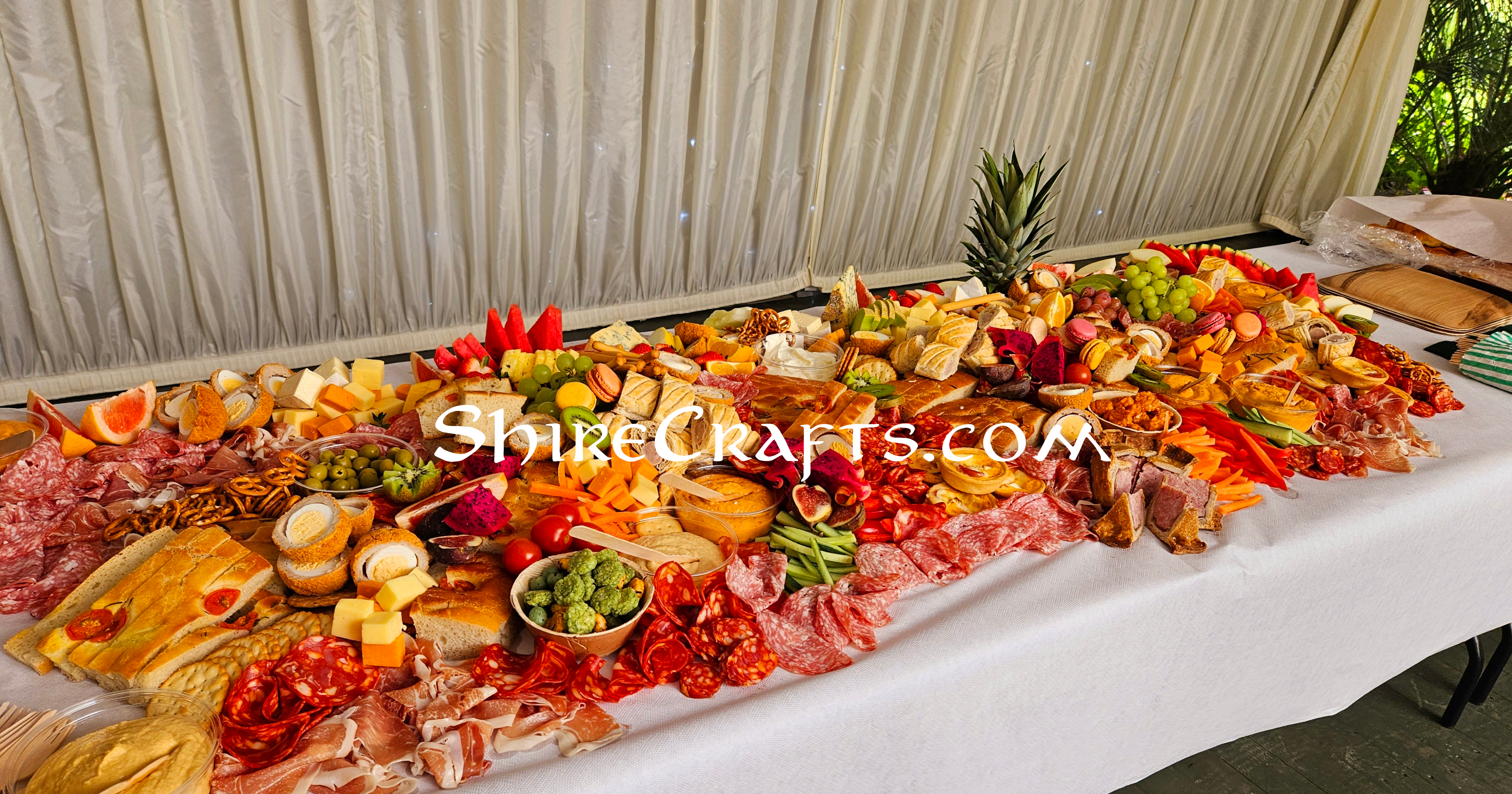A feast worth of a hobbit displayed on a table.