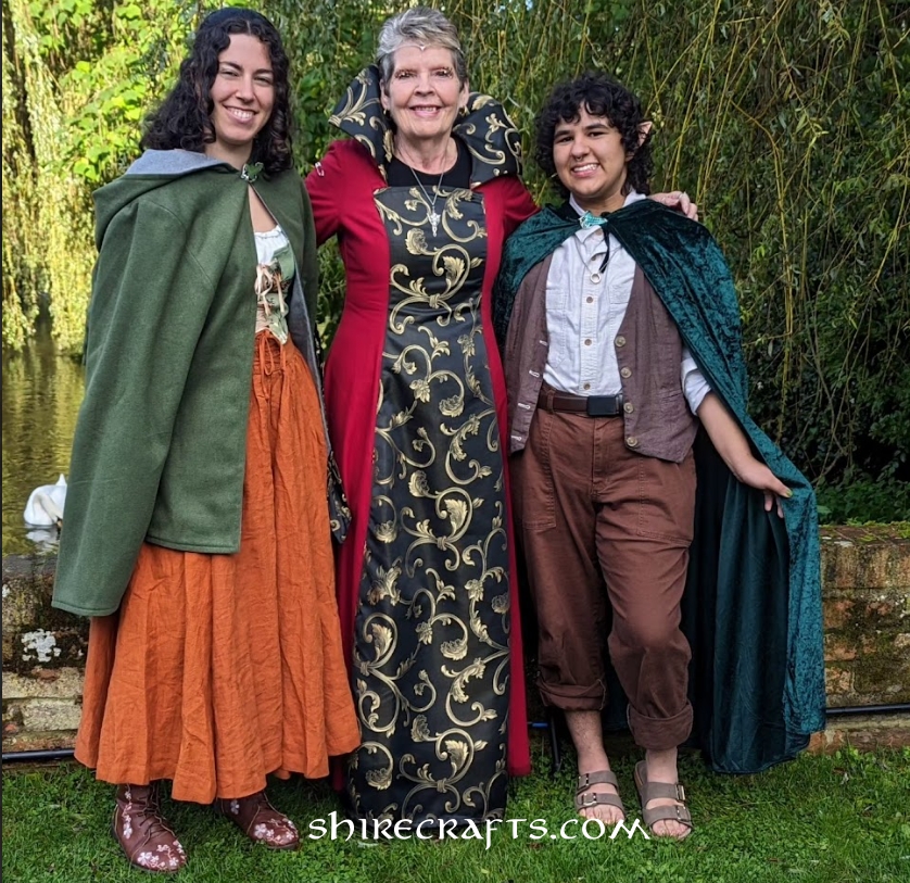 Three people dressed as LOTR characters'